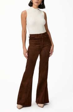 Stretch-kissed corduroy makes these retro flare pants a chic and comfy choice that exudes vintage-inspired style. 34 1/2" inseam; 28" leg opening; 12" front rise Zip fly with button closure Front scoop pockets; back patch pockets 68% cotton, 30% rayon, 2% spandex Machine wash, tumble dry Imported Brown Flare Corduroy Pants, Brown Bellbottom Pants Outfits, Brown Flare Pants Outfit, Flare Outfits, Business Casual Capsule Wardrobe, Brown Flare Pants, Business Casual Capsule, Corduroy Pants Outfit