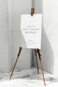 an easel stands in front of a white wall with the words, the night before