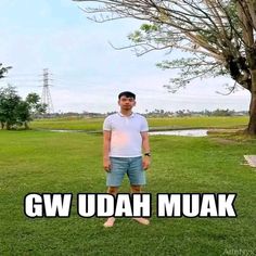 a man standing in front of a tree with the caption gw udah muak