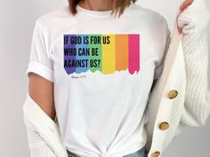 Rainbow Flag, Romans 8:31 lgbt Christian Tshirt, Rainbow lgbt Shirt, lgbt Christian Gift, lgbt Ally, Ally Shirt, lgbt Christian Faith TShirt  Embrace the intersection of faith and love with our LGBT Christian apparel. This thoughtfully crafted garment celebrates the beautiful diversity within the LGBTQ+ community while honoring the deeply rooted Christian values of acceptance, inclusion, and unconditional love. Designed with meticulous attention to detail, our apparel features a comfortable and Pre-shrunk Crew Neck Shirt For Pride, Cotton T-shirt With Rainbow Print For Pride, White Pre-shrunk Top For Pride, Graphic Tee With Rainbow Print For Pride, Rainbow Print Graphic Tee For Pride, Rainbow Graphic Print Tops For Pride, Multicolor Letter Print Tops For Pride, Casual Pre-shrunk T-shirt For Pride, White Rainbow Pride T-shirt