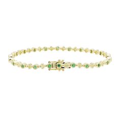 This Dabakarov emerald tennis bracelet is set in 14kt yellow gold. Perfect for any occasion, formal or casual, this dazzling bracelet carries all the magic and wisdom of emerald wherever you go. Emerald Tennis Bracelet, Mother Rings, Emerald Stone, Engraved Items, Green Emerald, Tennis Bracelet, Watch Brands, Emerald Green, Custom Jewelry