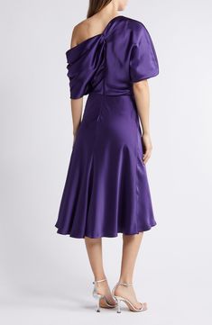 A graceful drape defines the chic silhouette of this toastworthy cocktail dress cut to a beloved midi length. 46 1/2" length (size 8) One-shoulder neck Elbow-length sleeves Lined 100% polyester Dry clean Imported Black Owned/Founded Elegant Purple A-line Midi Dress, Formal A-line Midi Dress With Draped Sleeves, Formal Pre-draped Knee-length Midi Dress, Pre-draped Knee-length Evening Midi Dress, Pre-draped Midi Dress With Draped Sleeves For Gala, Satin Tea-length Evening Midi Dress, Formal A-line Midi Dress With Ruched Detail, Evening Draped Midi Dress With Fitted Bodice, Silk Ruched Midi Evening Dress