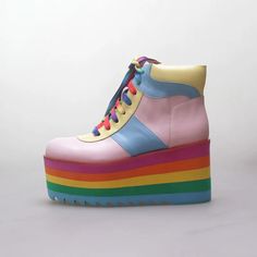 Bold Platform Heeled Boots With Round Toe, Bold Heeled Boots With Platform And Round Toe, Bold Platform Boots For Spring, Spring Platform High-top Heeled Boots, Spring High-top Platform Heeled Boots, Rainbow Platform Heels With Round Toe, Rainbow Round Toe Platform Heels, Retro Ankle Platform Boots, Multicolor High Ankle Platform Boots