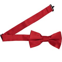 Get holiday ready with this red satin bow tie. The deep red hue will add the perfect amount of cheer, whether you're wearing it to the office holiday party or outfitting a group this December. Finish your look with some fun Christmas socks (sold separately). This bow tie is easy to wear. It's pre-tied, so the bow always looks top notch. The adjustable band secures around the collar and is sized for most teens and adults. The material is durable with a festive and elegant satin sheen. We recommen Red Satin Bow Tie Adjustable, Adjustable Red Satin Bow Tie, Red Bow Tie For Party, Red Bow Standard Bow Tie For Party, Red Adjustable Bow Tie With Bow Tie Back, Adjustable Red Bow Tie With Bow Tie Back, Red Satin Standard Bow Tie, Adjustable Red Satin Bow, Classic Red Ties With Bow Tie Back