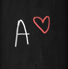 the word i love aa written in chalk on a blackboard with a red heart