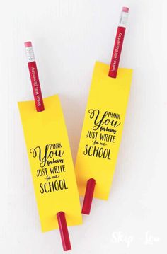 two yellow note holders with red pencils sticking out of them that say, thank you just write in the school