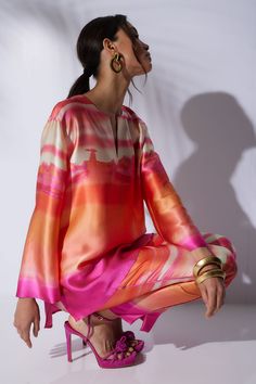 Natori Minako Silk Tunic Top, 100% Silk, Women's, Pink. Printed silk made for a leisurely escape. Length: 29" high point shoulder Slash neck tunic, side slits on both sides Glossy and luxurious silk charmeuse Flowy and airy silhouette 100% silk Dry clean only. The Natori Company designs high-end women's fashion, including Intimates, Sleepwear, Lingerie, Ready-to-Wear, Home, Perfume, Towels, Eyewear, and more.  Using an Asian aesthetic, Josie Natori was able to build a distinct brand, melding the Silk Outfits, Home Perfume, Silk Tunic Top, Asian Aesthetic, Silk Clothes, Josie Natori, Trend 2024, Beautiful Maxi Dresses, Silk Tunic