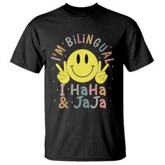 a black t - shirt that says i'm bilingual and has a smiley face on it