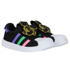 Black superstar 360 trainers for girls by adidas Originals. They feature purple panel on the heel tab with pull tab, have the iconic stripes on the side in pink, green and purple and cute minnie mouse on the tongue. Comfortable footbed and they have non slip white rubber soles. Comes with branded box.  #adidassuperstar360 #minniemousetrainers #girlssneakers #colorfuladidasshoes Black Superstar, Cute Minnie Mouse, Girls Sneakers