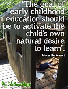 a child laying on the ground in front of a wooden structure with a quote from mary montessoi