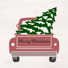 a red car with a christmas tree in the back and merry christmas written on it