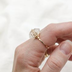 Hammered Band + wire wrapped Herkimer Diamond Stone: 14mm Herkimer Diamond Metal: 14k Gold Filled Holiday Processing Time: 3 Weeks Handmade by Amanda Michelle Diamond Stacking Rings, Hammered Band, Ring Sizer, Classic Gold, Herkimer Diamond, Stacking Ring, Diamond Stone, Gold Bands, Earring Necklace