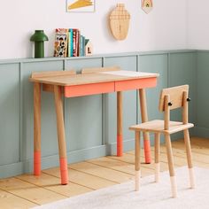 a child's desk and chair in a room