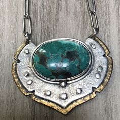 Green Turquoise Silver & Brass necklace   | eBay Unique Hand Forged Turquoise Necklace, Unique Turquoise Necklace With Patina, Bohemian Sterling Silver Necklace With Patina, Green Oxidized Pendant Necklace, Oval Patina Necklaces For Gifts, Unique Patina Round Pendant Necklace, Elegant Turquoise Pendant Necklace With Large Stone, Turquoise Necklace With Patina For Gifts, Artisan Oval Necklace With Large Stone