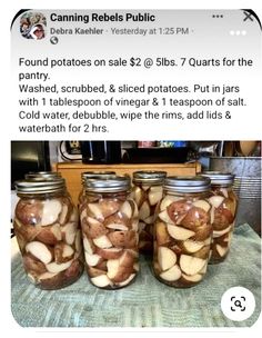 four jars filled with food sitting on top of a table