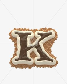 the letter k is made out of waffles and frosted with icing