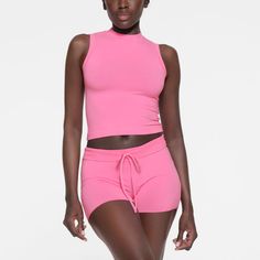 COTTON JERSEY MOCK NECK TANK | SUGAR PINK Bra Calculator, Mock Neck Tank, Waist Trainer, Cami Tanks, Cotton Tops, Jersey Fabric, Tank Shirt, Tank Top Shirt, Mock Neck