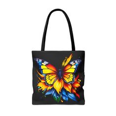 ### Flutter Into Style With The Vibrant Butterfly Print Tote BagElevate your style to soaring new heights with the striking Vibrant Butterfly Print Tote Bag! Perfect for fashion enthusiasts who crave both flair and functionality. This tote bag, crafted in the USA from premium 100% polyester, is an absolute game-changer for your accessory collection.Its sleek boxed corners, chic black inner stitching, and modern transparent thread showcase a level of craftsmanship that's second to none. The encha Butterfly Bags Handbags, Multicolor Rectangular Bags With Cat Print, Everyday Butterfly Print Tote Bag, Tropical Multicolor Tote Bag, Casual Multicolor Butterfly Print T-shirt, Print Tote, Butterfly Print, Printed Tote Bags, Tote Bag