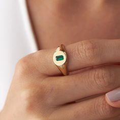 Our new dainty 14k gold emerald cut gemstone ring. Simple and elegant. 14K solid gold is perfect for everyday wear since it will never tarnish, and you don't have to worry about contact with conditioners or water. A perfect ring to stack as well. ★ Ring Features• Gold Kt: 14K Solid Gold (All rings are stamped for authenticity)• Available Gold Colors: Yellow Gold, White Gold, Rose Gold• Center Emerald Cut Gemstone Dimensions: 5.0 mm by 3.2 mm• Face Diameter: 9.1 mm / 0.36 Inch• Stone: Emerald Cut Green Gemstone Ring, Gold Diamond Earrings Studs, Diamond Huggies, Bangle Ring, Gold Colors, Ring Simple, Ruby Earrings, Sapphire Bracelet, Diamond Bangle