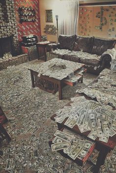 a living room filled with lots of furniture covered in money