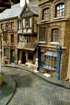 an old model town is shown on display