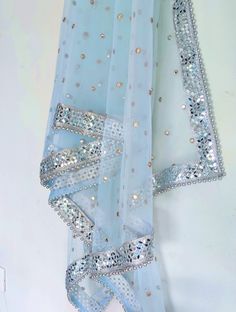 More dupatta here in our collection https://www.etsy.com/shop/neelcreations/?section_id=15880219 Perfect eye catcher blue Silver Dupatta with sequins.  This Indian dupatta is made of net and has mirror border with beads.  Net is very light blue in color and has mirror like embroidery. Border mirrors are real mirrors  This can be your wedding dress chunni for Indian occasion wear for festival. This has perfect bling for you to look classy and ethnic at same time. . This can even be your home deco Blue And Silver Aesthetic, Silver Dupatta, Indian Dupatta, Mirror Border, Blue Colour Dress, Simple Lehenga, Embroidery Border, Wedding Bridal Veils, Pakistani Wedding Outfits