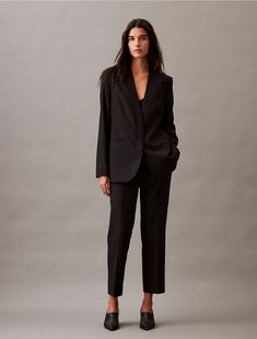 Tailored in a slim fit, these Calvin Klein suit pants are wrinkle-resistant and crafted with 4-way stretch for ease of movement. Detailed with an interior hook clasp and slip pockets in a clean, modern silhouette. Style with a blazer for a sharp outfit fitted for the office or special occasions.  Material: 66% Polyester, 31% Viscose, 3% Elastane. 90s Minimalism Fashion, Formal Wear Women, Slim Trousers, Tapered Pants, Suit Pants, Hook Clasp, Clean Modern, Suit Fashion, Formal Wear