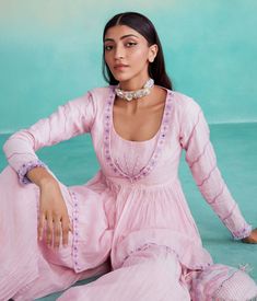 Introducing our exquisite rosalyn sharara set in orchid pink - a blend of elegance and tradition! This set features a charming peplum style kurta, adorned with delicate hand embroidery on the yoke and long sleeves, inspired by the rich heritage of traditional kutchi embroideries. The set also includes a beautifully flairy and micro pleated sharara, complemented by a hand-embroidered border that adds a touch of drama to your look. Embrace the allure of cultural craftsmanship with this stunning en Top And Sharara Set, Kurta And Sharara, Peplum Styles, Sharara Set, Aza Fashion, Fashion Set, Sleeve Type, Hand Embroidered, Peplum Top