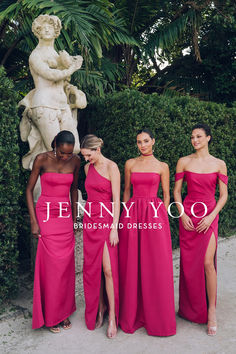 the bridesmaids are posing in front of a statue wearing pink gowns and matching heels