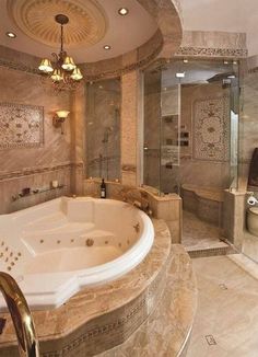 a fancy bathroom with a large jacuzzi tub