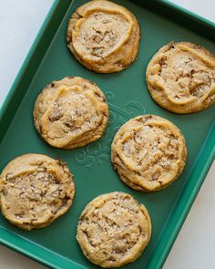 chocolate chip cookies on a green tray