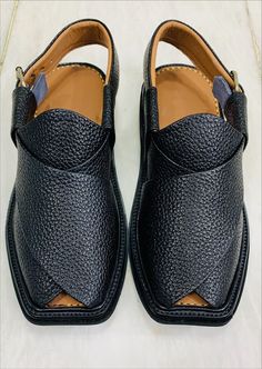 *This prized craft from Pakistan showcases the skill of South Asian artisans and utilizes the finest quality leather. This Jet-Black Leather Peshawari shoes not only elevates your style but also becomes a statement piece, enhancing your presence in any setting. Crafted with an additional sole for added comfort, our skilled artisans ensure precision and finesse in every stitch. *These exquisite handcrafted Black Peshawari Chappals are often referred to as Kaptaan Chappals or Imran Khan Chappals, Trendy Mens Shoes, Black Footwear, Mens Shoes Sandals, Boots Patterns, Imran Khan, South Asian, Sandals Black, Handcrafted Leather, Mens Sandals