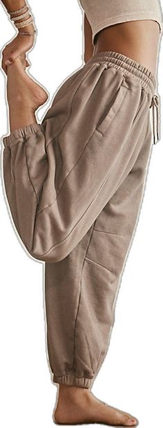 Fall Joggers With Drawstring And Loose Fit, Athleisure Pants With Elastic Cuffs For Fall, Baggy Sporty Sweatpants For Fall, Sporty Pull-on Sweatpants For Fall, Sporty Joggers With Loosely Fitted Hips For Fall, Sporty Baggy Sweatpants For Fall, Loosely Fitted Joggers For Leisure In Fall, Baggy Joggers With Elastic Waistband For Fall, Sporty Brown Joggers For Fall