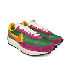 Nike x Sacai 'LD Waffle' low-top sneaker in beige suede with fuchsia pink, green, and yellow, white, and orange detailing. Features a see-through nylon upper, fuchsia pink leather heel with green logo, double logo swoosh, double flat laces in white, a double tongue, and white and black rubber sole. Includes box. Brand = Nike x Sacai Condition = 7/10, Good, discolouration to suede, rubber midsole, tongue, and laces Size = Men's 10.5 US Material = Nylon/Suede SKU = 3652-63 Green Running Sneakers With Rubber Waffle Outsoles, Green Custom Sneakers With Vibram Sole For Streetwear, Green Low-top Sneakers With Vibram Sole, Multicolor Low-top Running Shoes With Contrast Sole, Sporty Multicolor Sneakers With Gum Sole, Green Sporty Custom Sneakers With Vibram Sole, Sporty Green Custom Sneakers With Vibram Sole, Pink Low-top Running Shoes With Vibram Sole, Green Running Sneakers With Contrast Sole