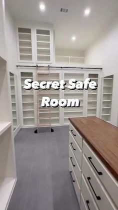 the secret safe room is located in this large closet with built - in bookcases