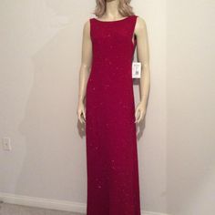 Bright Red Floor Length Gown With Sparkles Overall; Shimmery, Sexy, Shapely & Sleeveless ; Deep Scoop Back; Perfect For A Formal Night Out; Comfortable. 10%Spandex; 58"Length & 13" Shoulders. Nwt; Size 12 Holiday Sleeveless Embellished Gown, Red Sheath Maxi Dress For Evening, Red Sequined Maxi Dress For Evening, Holiday Embellished Sleeveless Gown, Sleeveless Evening Dress For Red Carpet And Holiday, Sleeveless Evening Dress For Red Carpet Holiday, Fitted Embellished Gown For Red Carpet, Embellished Fitted Gown For Red Carpet, Fitted Red Gown With Sequins