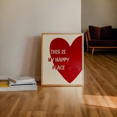 this is my happy place sign and books on the floor