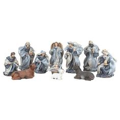 seven nativity figurines with dog and cat