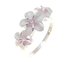 PRICES MAY VARY. Flower size: 8mm, 10mm, 8mm (approx. 5/16 inch) Petal: brush finish, weight of a size 8: approx. 2.6 grams Stone: pink Cubic Zirconia (CZ), stamp: 925 Free Jewelry Gift Box Included Sterling silver 925 3 Hawaiian plumeria flower ring pink cz size 7 Hawaiian Plumeria, Pink Ring, Hand Made Jewelry, Flower Ring, Toe Rings, Jewelry Gift Box, Free Jewelry, Womens Jewelry Rings, Metal Jewelry