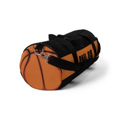 an orange and black duffel bag with a basketball on the front, side view