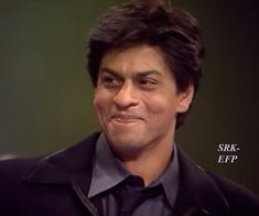 an image of a man that is looking at the camera with words above him saying, srk - eff