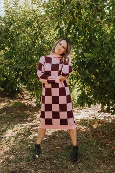 Look dashing and feel cozy this fall with The Turtleneck Checkered Sweater Dress by Pink Desert. Get ready to make a statement at all your sophisticated get-togethers with this eye-catching checkered pattern, turtleneck, and classic sweater dress style. You won't need to sacrifice warmth for style with this perfect fall dress! Paired with The Hayle Platform Boots in Black Funnel neck Long sleeves Cable knit texture throughout Midi length Sweater dress style Soft/stretchy material Not lined, slip Chic Gingham Plaid Dress For Fall, Fitted Pink Sweater Dress For Fall, Pink Long Sleeve Sweater Dress For Fall, Casual Pink Sweater Dress For Fall, Happy Threads, Pattern Turtleneck, Summer Goddess, Checkered Sweater, Chunky Turtleneck