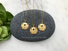 Matte Vermeil Gold Sand Dollar Medallion Pendant Necklace --- International Buyers: Please be familiar with your country's policies in regards to customs fees prior to purchasing overseas. Any fees/taxes are the buyer's responsibility and may be charged at the time of delivery/pick-up. This is not included in the costs here. Thank you! These stunning Medallion Necklaces are perfect stand alone and layering pieces. Features a Sand Dollar Coin Medallion with lots of rustic texture and interest. Ma Beachy Necklace, Sand Dollar Necklace, Jewelry Rustic, Sand Dollar Pendant, Gold Sand, Gold Filled Necklace, Seashell Necklace, Dollar Coin, Rustic Jewelry