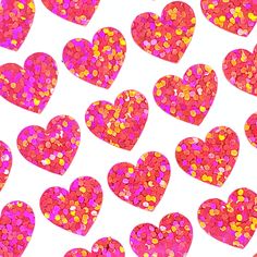 pink and yellow hearts are arranged in the shape of confetti on a white background