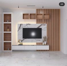 a living room with white walls and wooden shelves on the wall is an entertainment center that has a large flat screen tv mounted above it