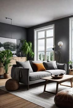 a living room filled with furniture and lots of window sill space next to a large window