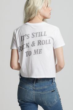 Rock out and get in the groove with our classic Billy Joel, “It’s Still Rock & Roll To Me” tee. Add this cropped fit to your closet which features Billy Joel graphic surrounded by the city and made with 100% cotton. Details Style #302107 Color: White Billy Joel It’s Still Rock & Roll To Me Cropped T-Shirt 100% Cotton Care/Import Machine Wash Cold, Tumble Dry Low Designed and Finished in Los Angeles Measurements Model is wearing size S Height: 5'10" Bust: 32B", Waist: 25", Hips: 34" Billy Joel, Toddler Boy Shoes, Winter Sneakers, Boys Coat, Cropped T Shirt, Rock Roll, Mens Skin Care, Signature Logo, Back To Black