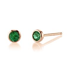 ROW DESCRIPTION Classic emerald birthstone earrings for May babies. Sparkling studs perfect for everyday wear. Emeralds are often given as a gift for 20th and 35th anniversaries. Emerald has been associated with Venus, the Goddess of Love and it is believed that emeralds assist in the flow of our breath and the opening of our heart. GEMSTONE Two Bezel Set Emerald Stones, 0.20 -0.22tcw. 75% RECLAIMED METAL 0.8g 14k Solid Yellow, White or Rose Gold. DIMENSIONS 4mm Round Setting. Friction Push Back Emerald Birthstone, Small Gold Hoops, Organic Cleaning Products, Goddess Of Love, Pave Ring, Star Bracelet, Emerald Stone, Birthstone Earring, Gemstone Studs