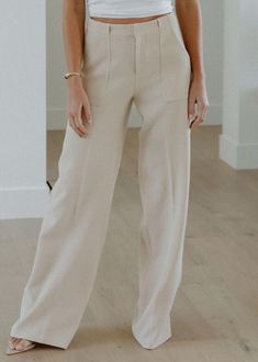 These pants are fully lined with an invisible zipper & button closure.
Flat front silhouette.
Wide legged pants.
Two full front side seam pockets.
96% Polyester 4% Spandex.
Model is wearing a size S. Wide Legged Pants, Knit Bottom, Football Tees, Heather White, Wide Leg Pant, Black Midi Dress, Invisible Zipper, Striped Shirt, Infant Tees