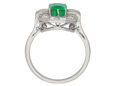 For Sale on 1stdibs - Art Deco emerald and diamond ring. Set with an octagonal emerald-cut natural Colombian emerald with no colour enhancement in an open back claw setting Diamond Cluster Rings, Art Deco Emerald, Emerald And Diamond Ring, Platinum Diamond Engagement Rings, Cluster Rings, Colombian Emeralds, Platinum Engagement Rings, Diamond Cluster Ring, Diamond Cluster